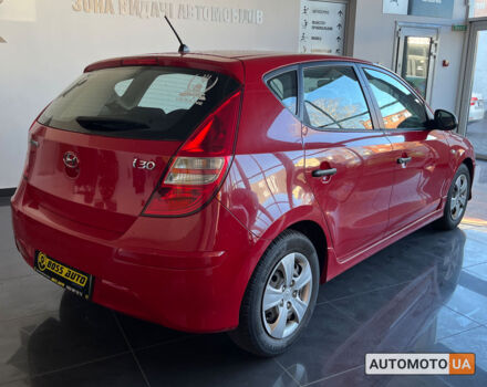 Красный Хендай i30, объемом двигателя 1.4 л и пробегом 182 тыс. км за 6300 $, фото 6 на Automoto.ua