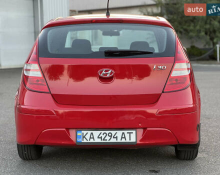 Красный Хендай i30, объемом двигателя 1.59 л и пробегом 165 тыс. км за 6950 $, фото 3 на Automoto.ua