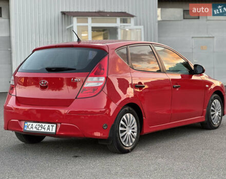 Красный Хендай i30, объемом двигателя 1.59 л и пробегом 165 тыс. км за 6950 $, фото 2 на Automoto.ua
