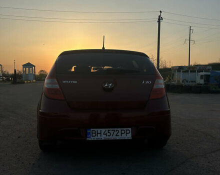 Красный Хендай i30, объемом двигателя 1.59 л и пробегом 227 тыс. км за 6200 $, фото 10 на Automoto.ua