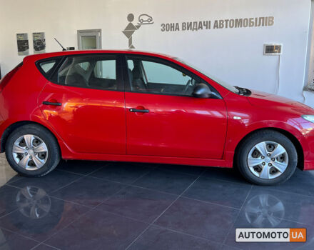 Красный Хендай i30, объемом двигателя 1.4 л и пробегом 182 тыс. км за 6300 $, фото 7 на Automoto.ua