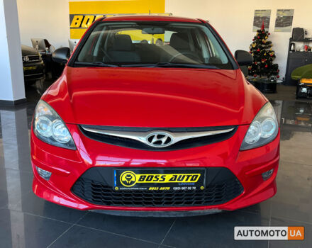 Красный Хендай i30, объемом двигателя 1.4 л и пробегом 182 тыс. км за 6300 $, фото 1 на Automoto.ua