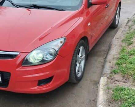Красный Хендай i30, объемом двигателя 1.4 л и пробегом 235 тыс. км за 5099 $, фото 4 на Automoto.ua