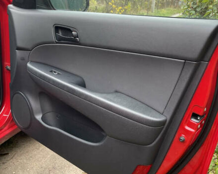 Красный Хендай i30, объемом двигателя 1.59 л и пробегом 195 тыс. км за 7200 $, фото 27 на Automoto.ua