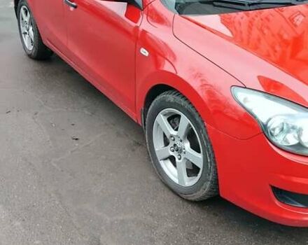 Красный Хендай i30, объемом двигателя 1.4 л и пробегом 235 тыс. км за 5099 $, фото 1 на Automoto.ua