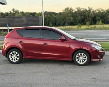 Червоний Хендай i30, об'ємом двигуна 1.4 л та пробігом 261 тис. км за 4450 $, фото 2 на Automoto.ua