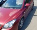 Красный Хендай i30, объемом двигателя 1.4 л и пробегом 110 тыс. км за 9300 $, фото 1 на Automoto.ua