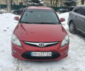 Красный Хендай i30, объемом двигателя 1.58 л и пробегом 264 тыс. км за 5800 $, фото 1 на Automoto.ua