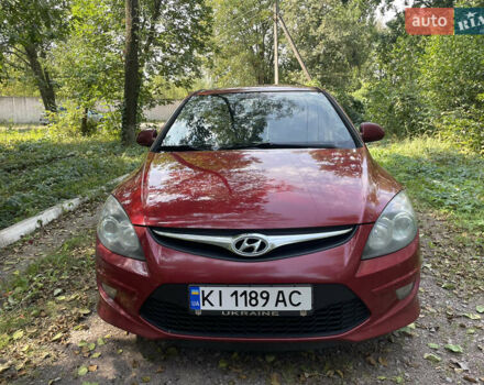 Красный Хендай i30, объемом двигателя 1.6 л и пробегом 225 тыс. км за 6100 $, фото 3 на Automoto.ua