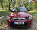 Красный Хендай i30, объемом двигателя 1.6 л и пробегом 225 тыс. км за 6100 $, фото 3 на Automoto.ua