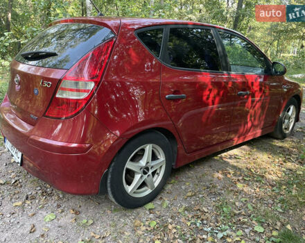 Красный Хендай i30, объемом двигателя 1.6 л и пробегом 225 тыс. км за 6100 $, фото 12 на Automoto.ua
