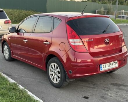 Червоний Хендай i30, об'ємом двигуна 1.4 л та пробігом 261 тис. км за 4450 $, фото 3 на Automoto.ua