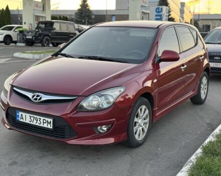 Червоний Хендай i30, об'ємом двигуна 1.4 л та пробігом 261 тис. км за 4450 $, фото 1 на Automoto.ua