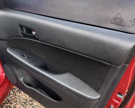 Красный Хендай i30, объемом двигателя 1.58 л и пробегом 167 тыс. км за 7950 $, фото 5 на Automoto.ua