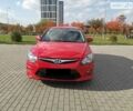 Красный Хендай i30, объемом двигателя 1.4 л и пробегом 122 тыс. км за 6500 $, фото 1 на Automoto.ua