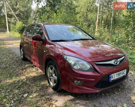 Красный Хендай i30, объемом двигателя 1.6 л и пробегом 225 тыс. км за 6100 $, фото 4 на Automoto.ua
