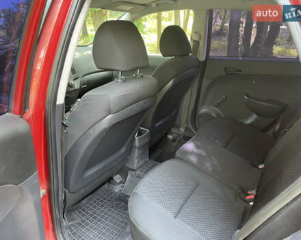 Красный Хендай i30, объемом двигателя 1.6 л и пробегом 225 тыс. км за 6100 $, фото 19 на Automoto.ua