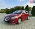 Червоний Хендай i30, об'ємом двигуна 1.4 л та пробігом 261 тис. км за 5699 $, фото 1 на Automoto.ua