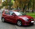 Червоний Хендай i30, об'ємом двигуна 1.4 л та пробігом 13 тис. км за 9400 $, фото 1 на Automoto.ua