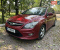 Красный Хендай i30, объемом двигателя 1.6 л и пробегом 225 тыс. км за 6100 $, фото 1 на Automoto.ua