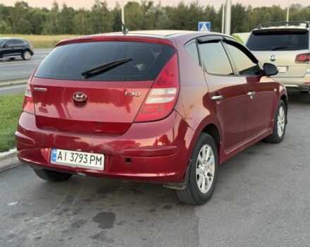 Червоний Хендай i30, об'ємом двигуна 1.4 л та пробігом 261 тис. км за 4450 $, фото 4 на Automoto.ua