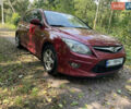 Красный Хендай i30, объемом двигателя 1.6 л и пробегом 225 тыс. км за 6100 $, фото 6 на Automoto.ua