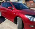 Красный Хендай i30, объемом двигателя 1.59 л и пробегом 189 тыс. км за 6700 $, фото 1 на Automoto.ua