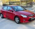 Красный Хендай i30, объемом двигателя 1.4 л и пробегом 217 тыс. км за 6990 $, фото 2 на Automoto.ua