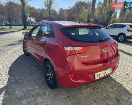 Червоний Хендай i30, об'ємом двигуна 1.4 л та пробігом 70 тис. км за 12500 $, фото 13 на Automoto.ua