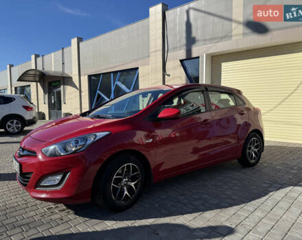 Червоний Хендай i30, об'ємом двигуна 1.4 л та пробігом 70 тис. км за 12500 $, фото 2 на Automoto.ua