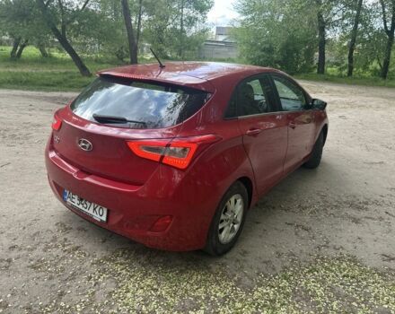 Красный Хендай i30, объемом двигателя 1.6 л и пробегом 100 тыс. км за 7500 $, фото 4 на Automoto.ua