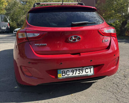 Червоний Хендай i30, об'ємом двигуна 1.59 л та пробігом 61 тис. км за 13000 $, фото 3 на Automoto.ua