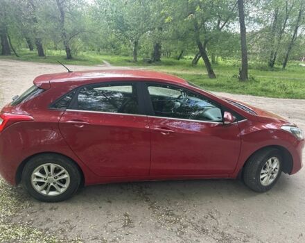 Красный Хендай i30, объемом двигателя 1.6 л и пробегом 100 тыс. км за 7500 $, фото 3 на Automoto.ua