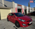 Червоний Хендай i30, об'ємом двигуна 1.4 л та пробігом 70 тис. км за 12500 $, фото 1 на Automoto.ua