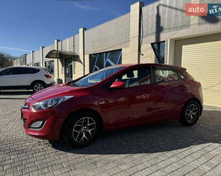 Червоний Хендай i30, об'ємом двигуна 1.4 л та пробігом 70 тис. км за 12500 $, фото 17 на Automoto.ua