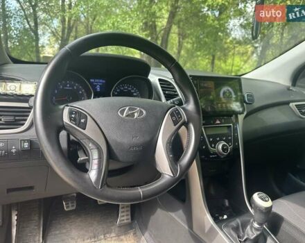 Красный Хендай i30, объемом двигателя 1.59 л и пробегом 100 тыс. км за 8200 $, фото 7 на Automoto.ua