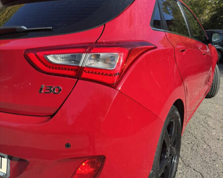 Червоний Хендай i30, об'ємом двигуна 1.59 л та пробігом 61 тис. км за 13000 $, фото 1 на Automoto.ua