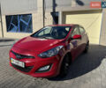 Червоний Хендай i30, об'ємом двигуна 1.4 л та пробігом 70 тис. км за 12500 $, фото 1 на Automoto.ua