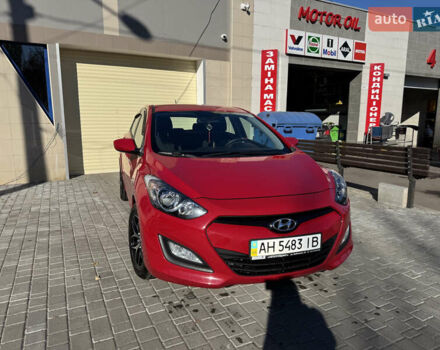 Червоний Хендай i30, об'ємом двигуна 1.4 л та пробігом 70 тис. км за 12500 $, фото 4 на Automoto.ua