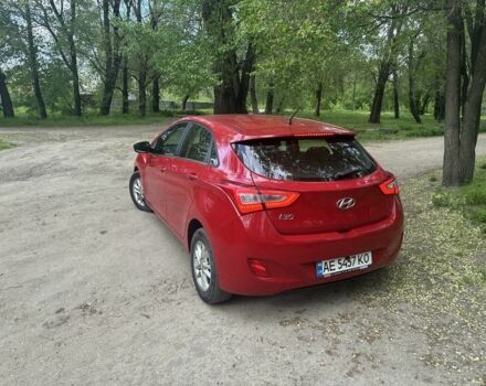 Красный Хендай i30, объемом двигателя 1.6 л и пробегом 100 тыс. км за 7500 $, фото 5 на Automoto.ua