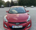 Красный Хендай i30, объемом двигателя 1.4 л и пробегом 157 тыс. км за 7600 $, фото 1 на Automoto.ua