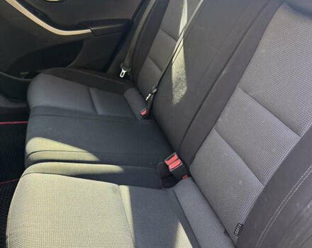 Червоний Хендай i30, об'ємом двигуна 1.59 л та пробігом 61 тис. км за 13000 $, фото 14 на Automoto.ua