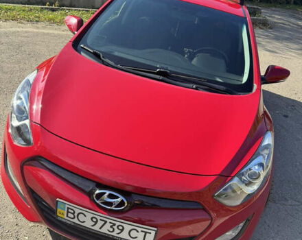 Червоний Хендай i30, об'ємом двигуна 1.59 л та пробігом 61 тис. км за 13000 $, фото 11 на Automoto.ua
