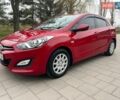 Красный Хендай i30, объемом двигателя 1.59 л и пробегом 116 тыс. км за 9500 $, фото 1 на Automoto.ua