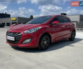 Красный Хендай i30, объемом двигателя 1.58 л и пробегом 208 тыс. км за 8990 $, фото 1 на Automoto.ua
