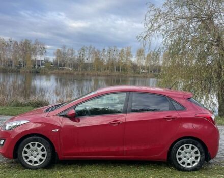 Хендай i30 2013 в Емильчином на Automoto.ua Красный Хендай i30, объемом двигателя 1.4 л и пробегом 85 тыс. км за 8200 $, фото 7 на Automoto.ua