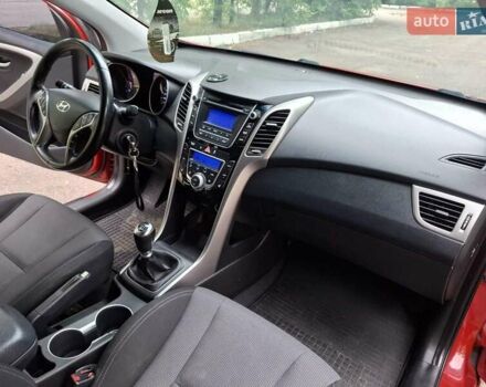 Красный Хендай i30, объемом двигателя 1.58 л и пробегом 208 тыс. км за 7700 $, фото 13 на Automoto.ua