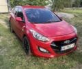 Червоний Хендай i30, об'ємом двигуна 1.4 л та пробігом 145 тис. км за 7000 $, фото 1 на Automoto.ua