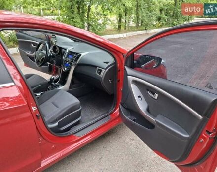 Красный Хендай i30, объемом двигателя 1.58 л и пробегом 208 тыс. км за 7700 $, фото 12 на Automoto.ua