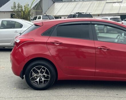 Хендай i30 2013 в Киеве на Automoto.ua Красный Хендай i30, объемом двигателя 1.4 л и пробегом 122 тыс. км за 9790 $, фото 4 на Automoto.ua